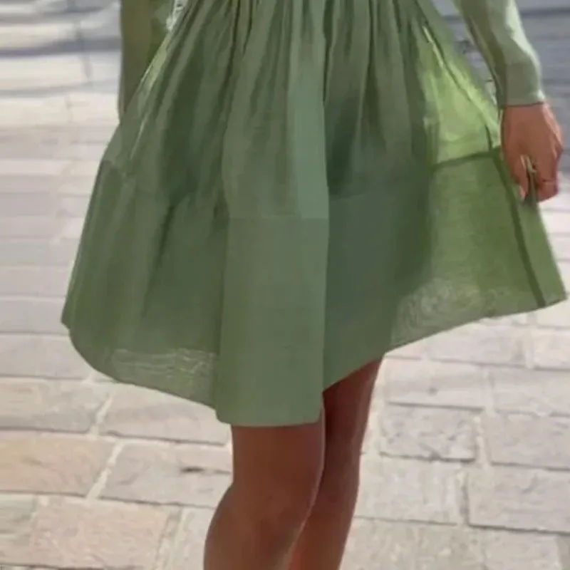 Mint green pleated cake dress