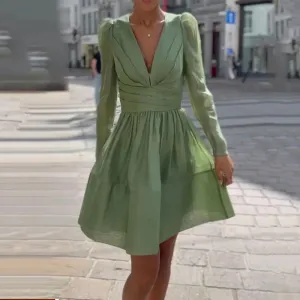 Mint green pleated cake dress